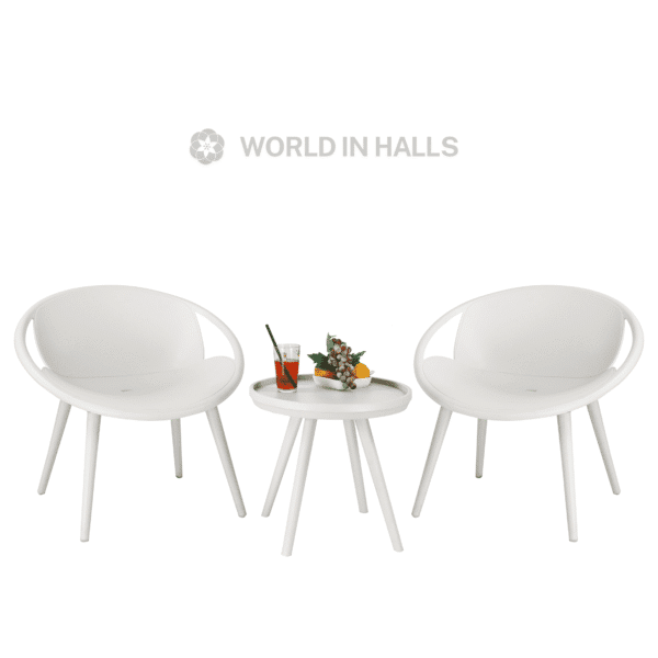 Outdoor bistro set featuring sleek plastic chairs and a matching table with fruit and a drink.