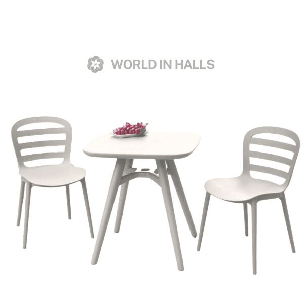 Slatted bistro table and two chairs in a stylish outdoor setting