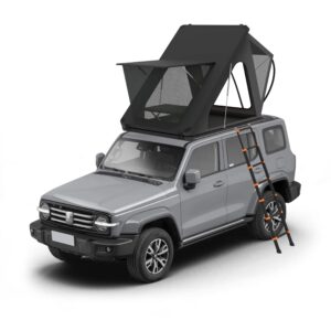 Car tent set up at the beach with a family enjoying a picnic