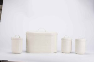 Galvanized iron canister and bread bin set on kitchen counter.
