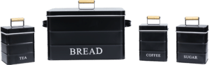 Black metal bread bin with bamboo handle and matching tea, coffee, and sugar storage bins in a modern kitchen style.
