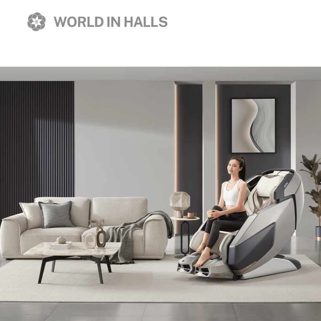 A woman sitting in a high-tech massage chair in a modern, minimalist living room with World in Halls branding above.